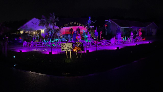 Warren’s Halloween Bash setup, featuring animatronics, fog effects, spooky decorations.